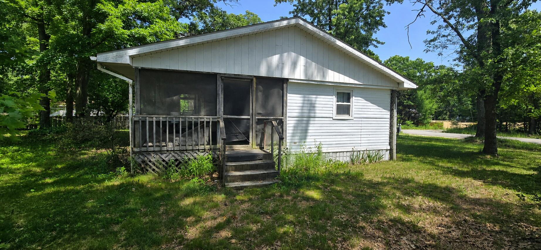 6155 Automobile Road Twin Lake, MI 49457 - Photo 9 of 12 Side of home