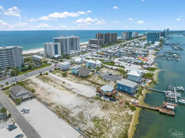 a view of a lake with a yard