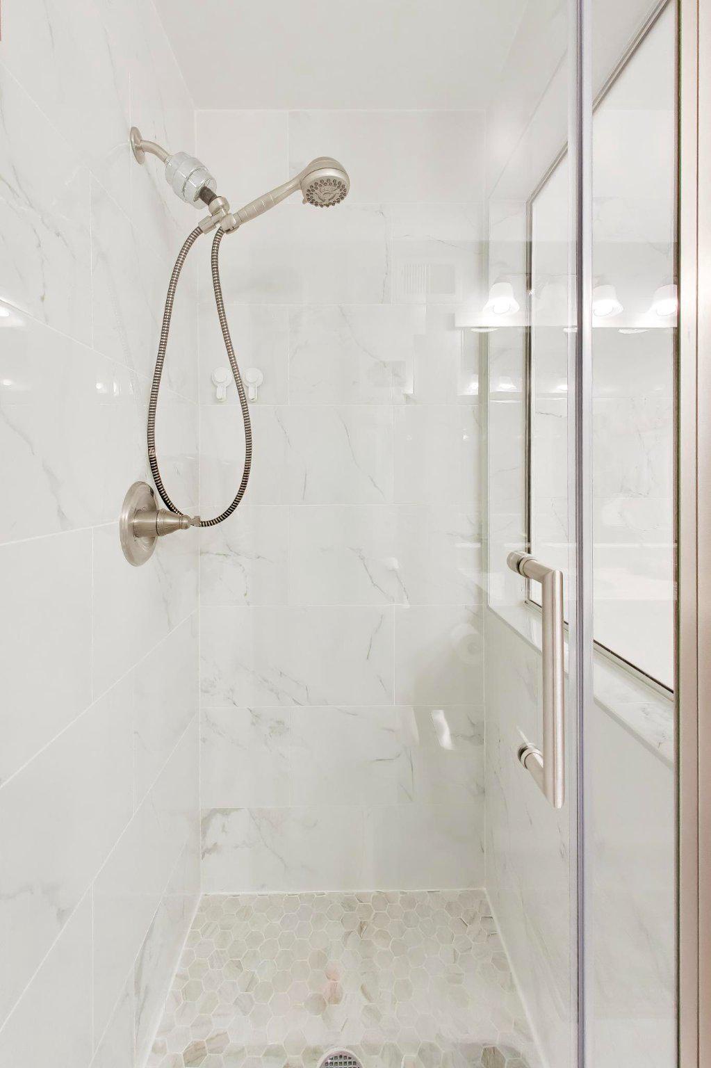 11830 Breton Court, Unit 23B Reston, VA 20191 - Photo 33 of 43 Walk-in shower