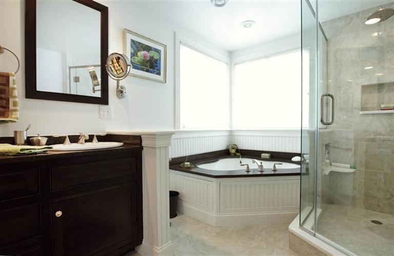 9 North Bay Road Osterville, MA 02655 - Photo 13 of 25 a bathroom with a sink and a mirror