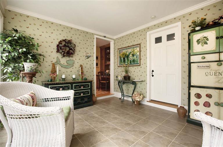 9 North Bay Road Osterville, MA 02655 - Photo 21 of 25 a living room with furniture and a flat screen tv