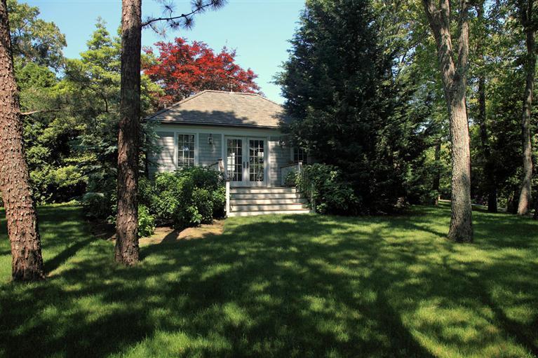 9 North Bay Road Osterville, MA 02655 - Photo 25 of 25 a front view of a house with a garden