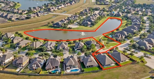 an aerial view of a city with houses