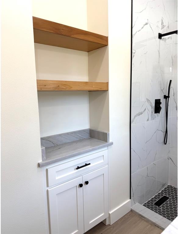 3320 North 27th Street Waco, TX 76708 - Photo 25 of 38 a bathroom with a shower and a sink
