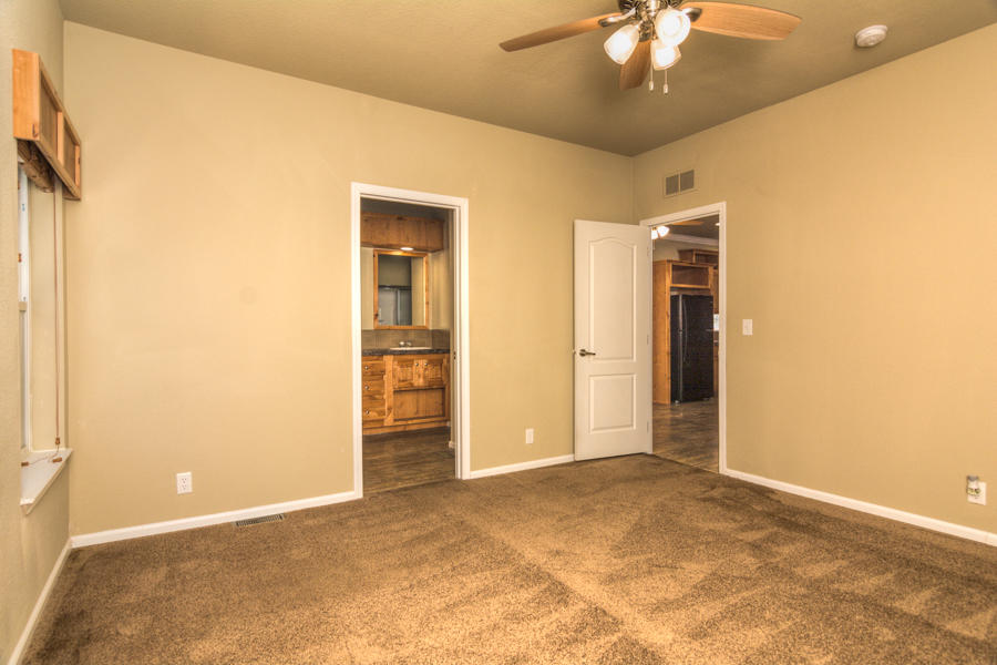 56264 Black Duck Road Bend, OR 97707 - Photo 14 of 31 The Master Bedroom is comfortably sized.