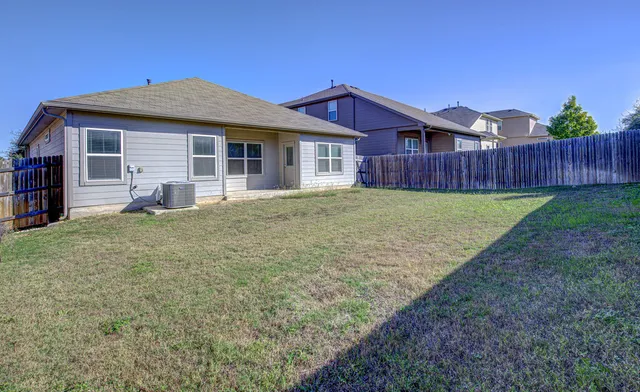 a view of a backyard with plants