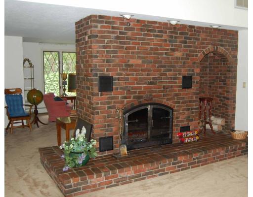283 Ipswich Road Boxford, MA 01921 - Photo 5 of 7 a brick building with a bench in front of it