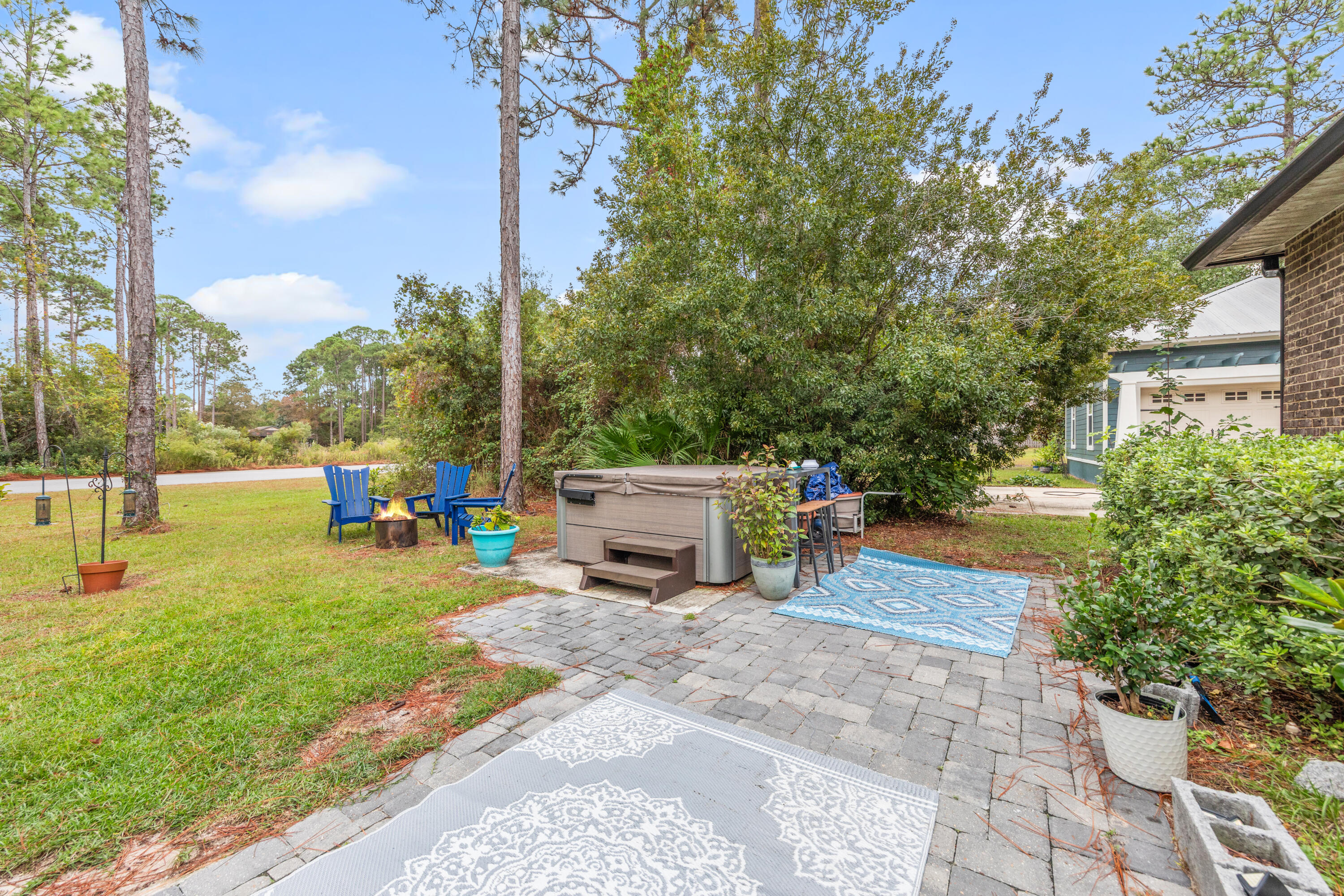 40 Oyster Boulevard Freeport, FL 32439 - Photo 25 of 30 a view of a patio with a table and chairs under an umbrella
