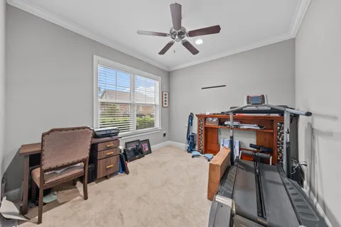 a bed room with furniture and a window
