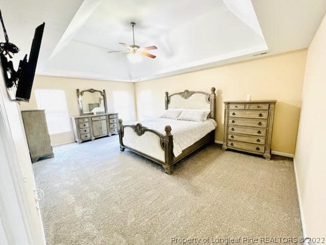 455 Heathrow Drive Spring Lake, NC 28390 - Photo 2 of 5 a spacious bedroom with a bed and walk in closet