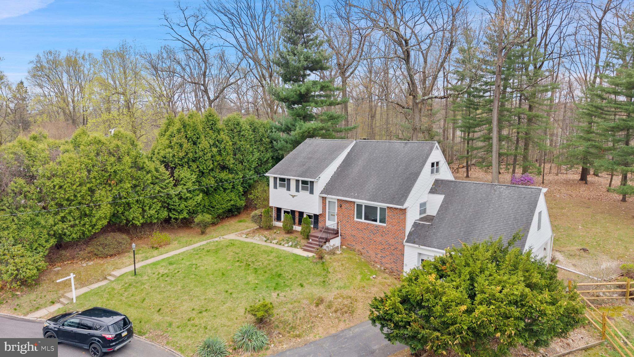117 Spring Road Malvern, PA 19355 - Photo 11 of 25 a view of a house with a yard