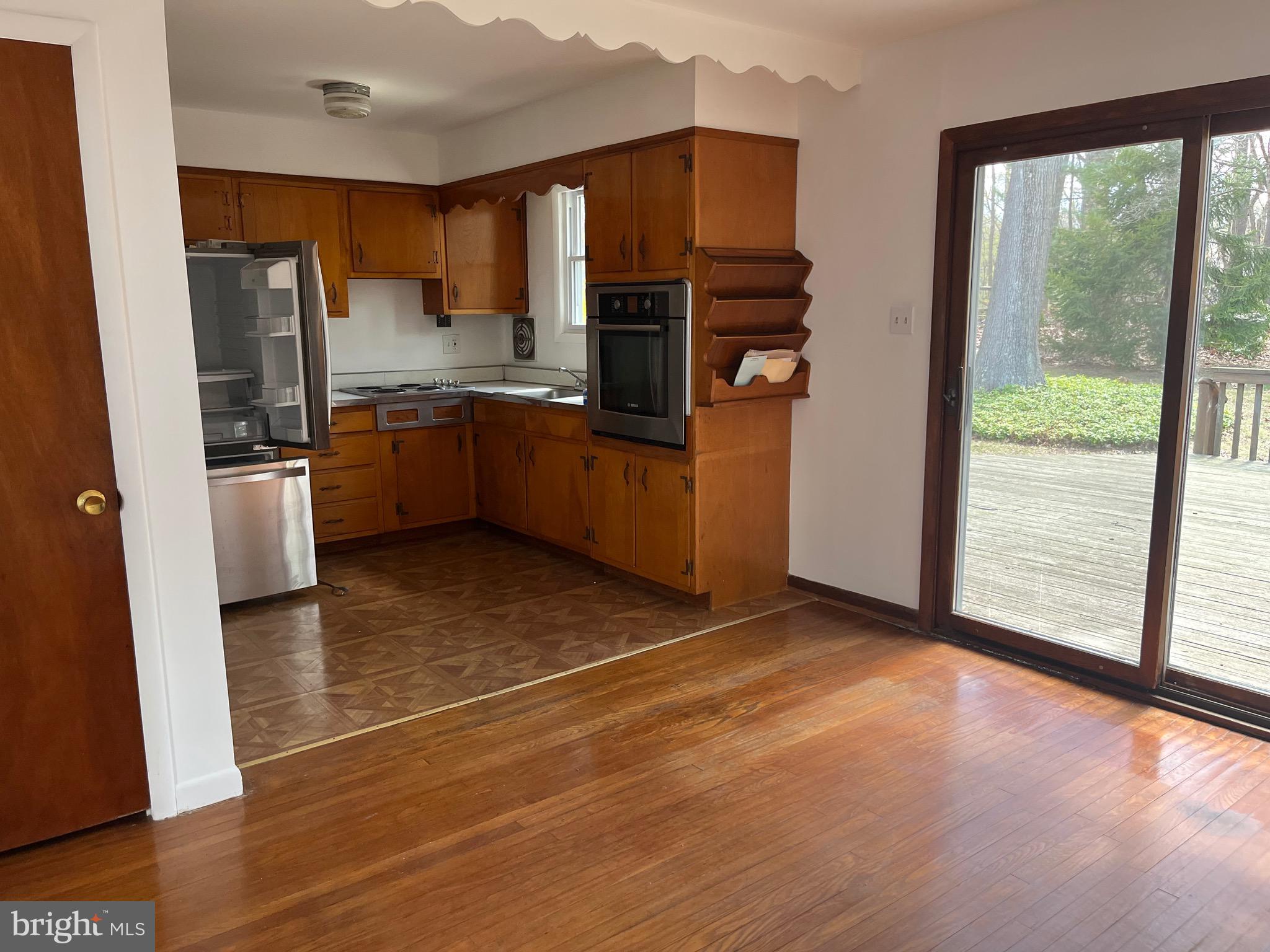 117 Spring Road Malvern, PA 19355 - Photo 19 of 25 a kitchen with stainless steel appliances a refrigerator and a sink