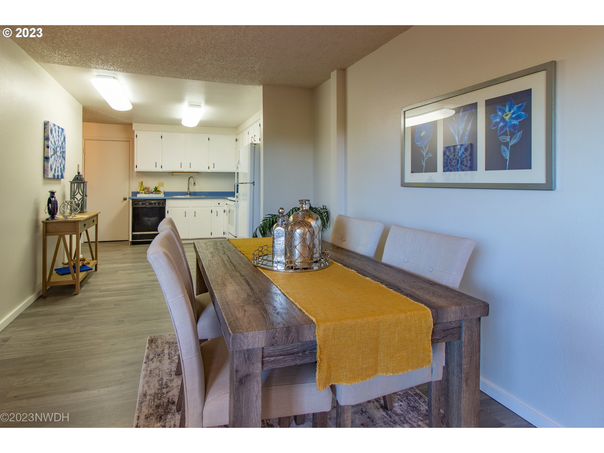 1302 Quaker Street Eugene, OR 97402 - Photo 11 of 28 a view of a dining room with furniture and wooden floor