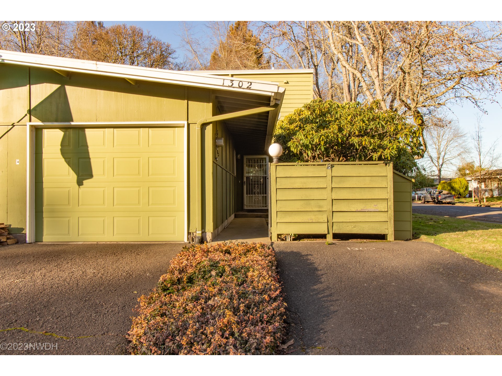 1302 Quaker Street Eugene, OR 97402 - Photo 2 of 28 a view of a house with a garage