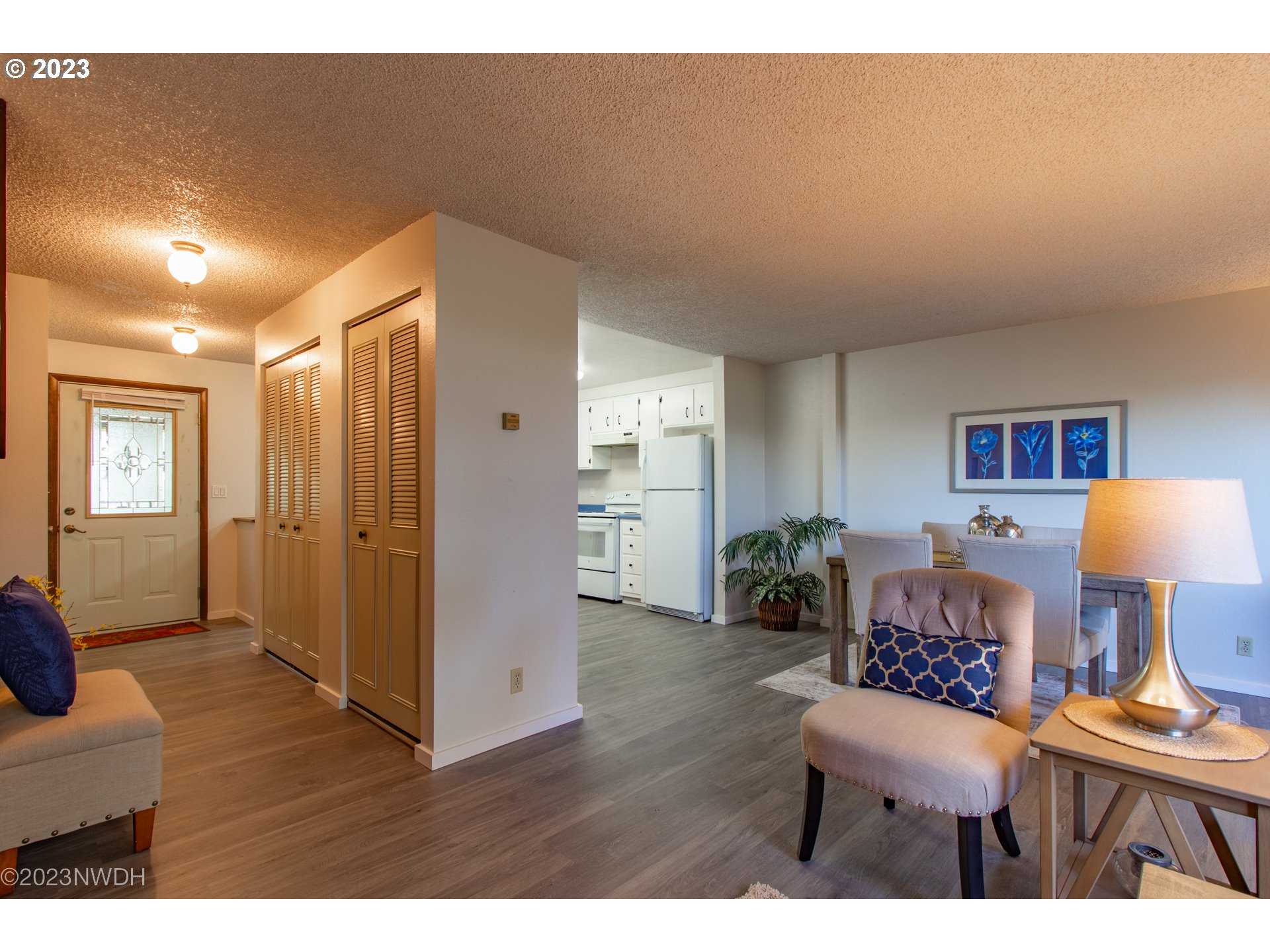 1302 Quaker Street Eugene, OR 97402 - Photo 7 of 28 a living room with furniture and a wooden floor