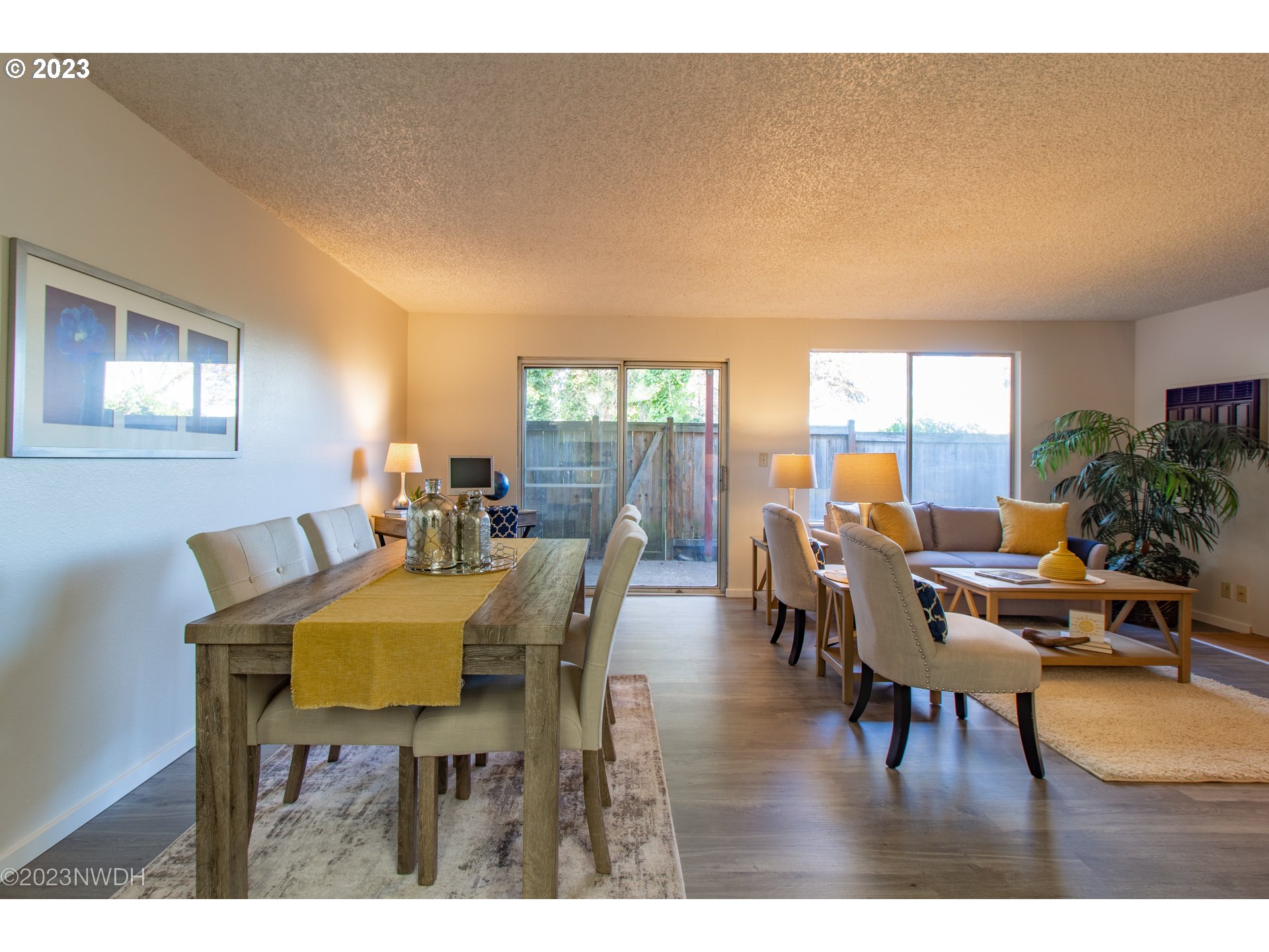 1302 Quaker Street Eugene, OR 97402 - Photo 8 of 28 a view of a dining room with furniture and wooden floor