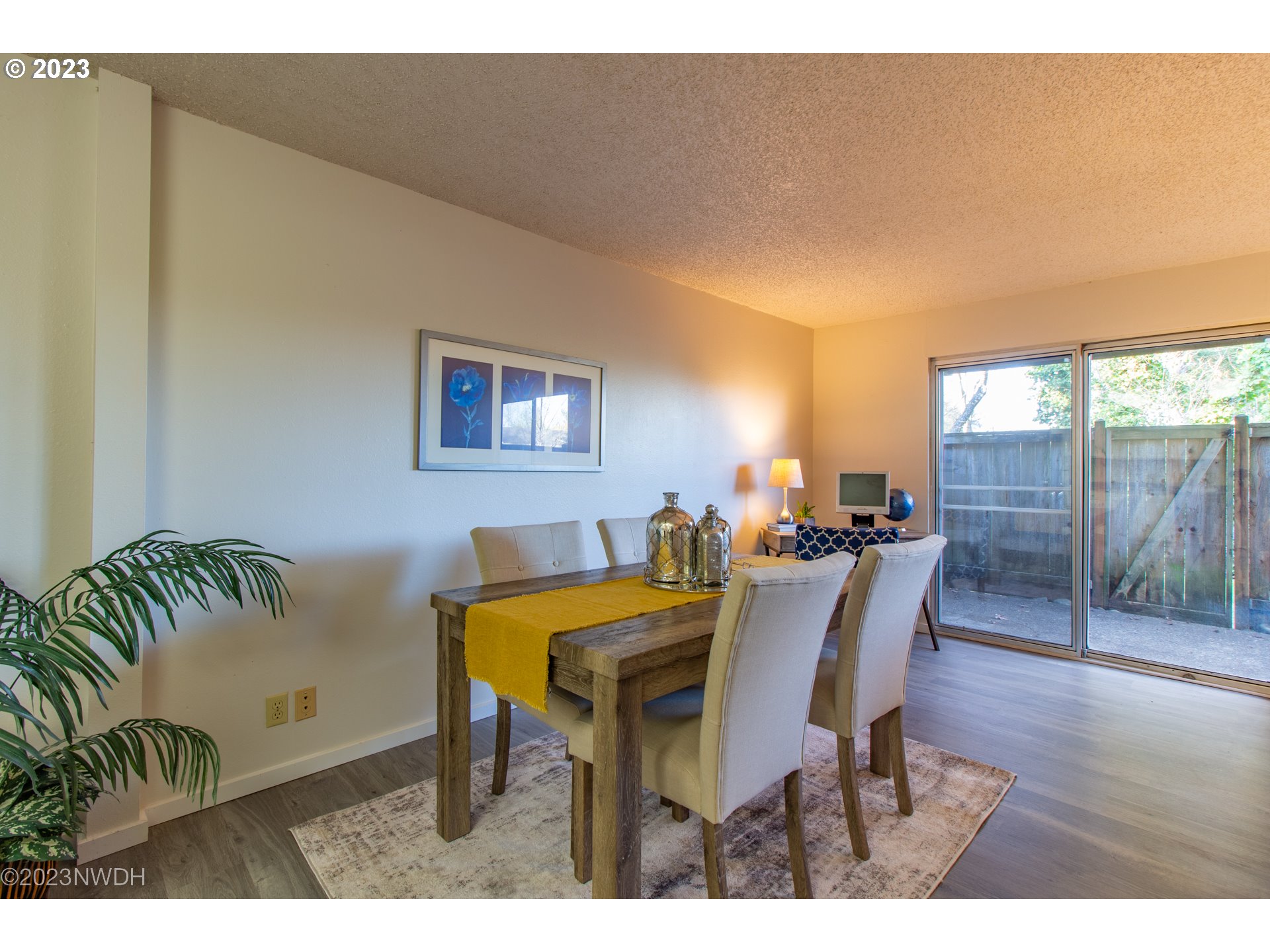 1302 Quaker Street Eugene, OR 97402 - Photo 9 of 28 a view of a dining room with furniture and wooden floor