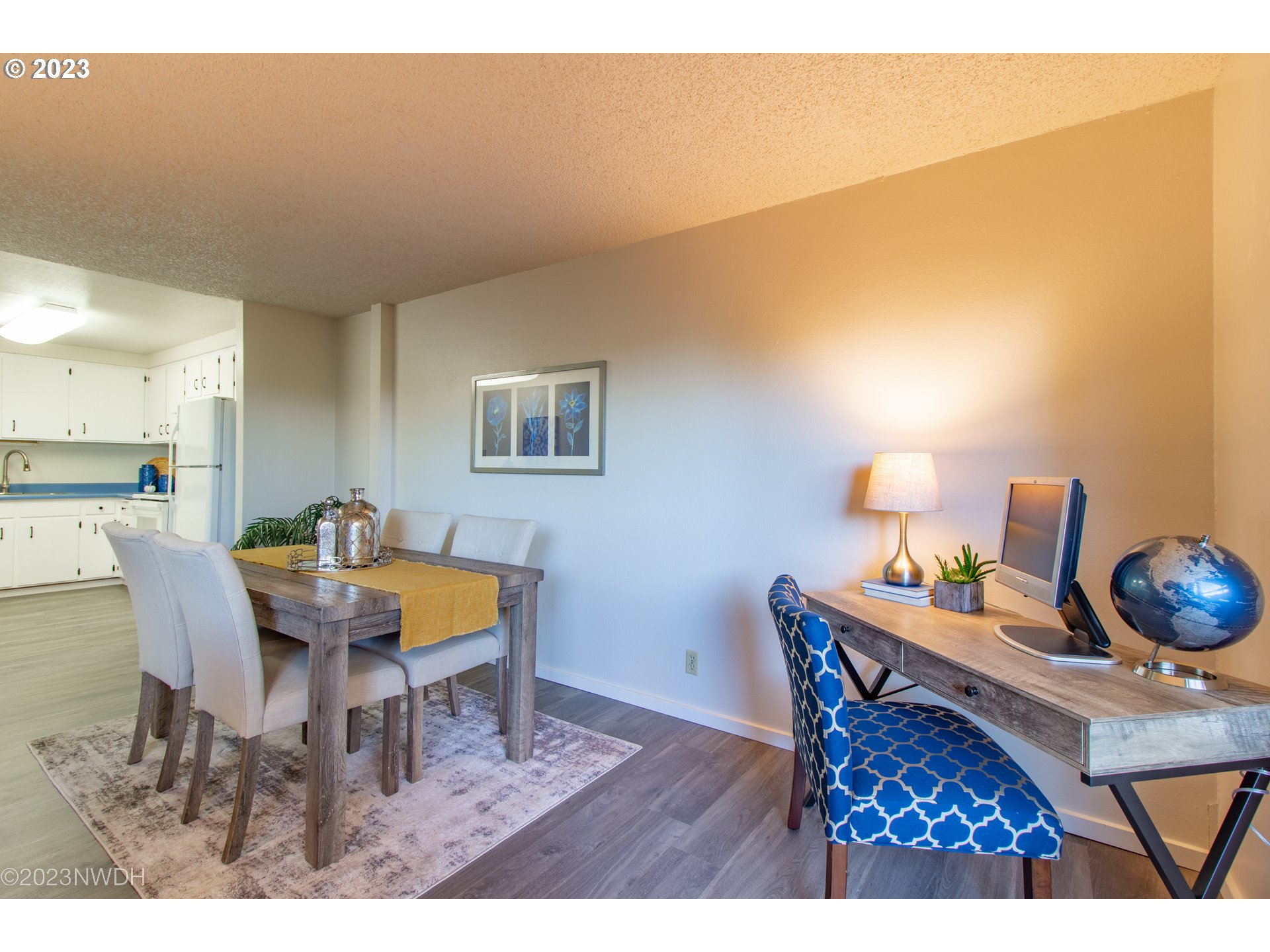 1302 Quaker Street Eugene, OR 97402 - Photo 10 of 28 a dining room with furniture and wooden floor