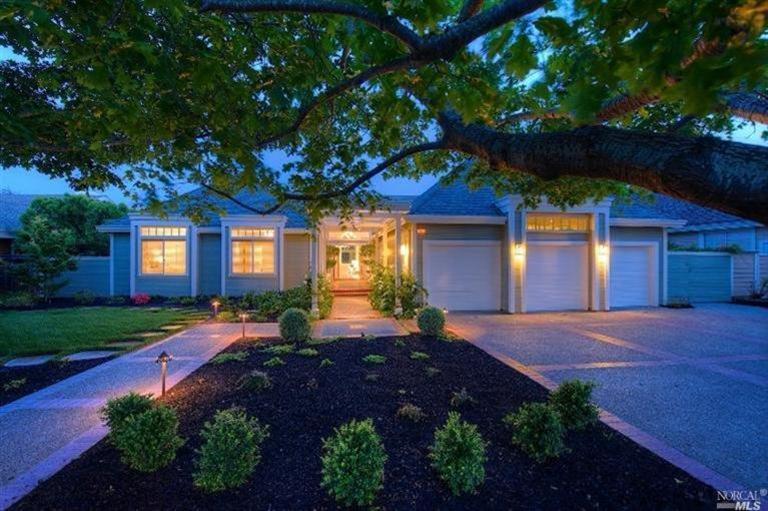 a house view with a garden space