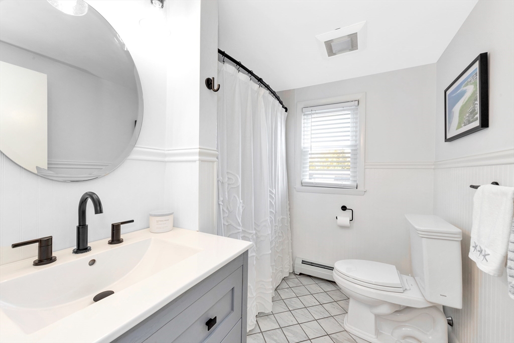 2 Morningside Drive Danvers, MA 01923 - Photo 11 of 25 a bathroom with a sink a toilet and a mirror