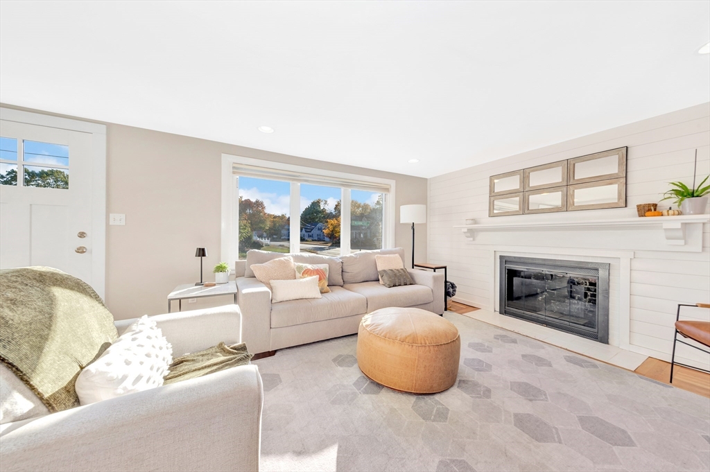 2 Morningside Drive Danvers, MA 01923 - Photo 3 of 25 a living room with furniture and a fireplace