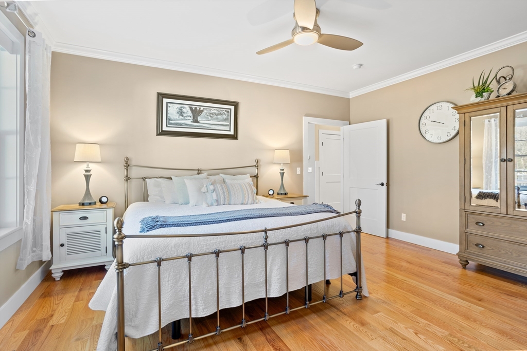 135 South Road Holden, MA 01520 - Photo 17 of 42 a bedroom with a bed and a table in it