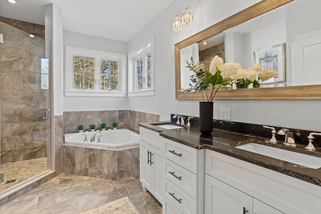 135 South Road Holden, MA 01520 - Photo 18 of 42 a bathroom with a sink and a mirror