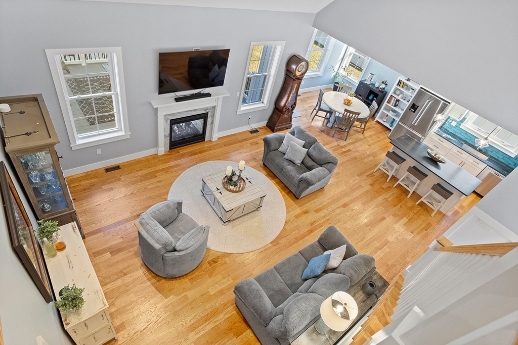 135 South Road Holden, MA 01520 - Photo 21 of 42 a living room with furniture and a flat screen tv