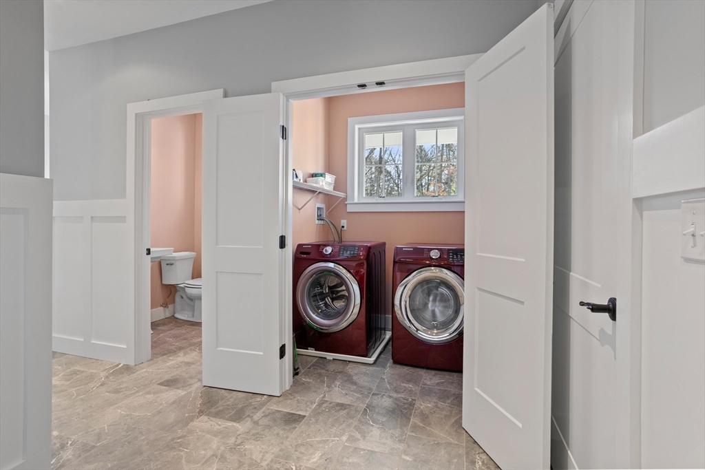 135 South Road Holden, MA 01520 - Photo 28 of 42 a view of washer and dryer in a utility room