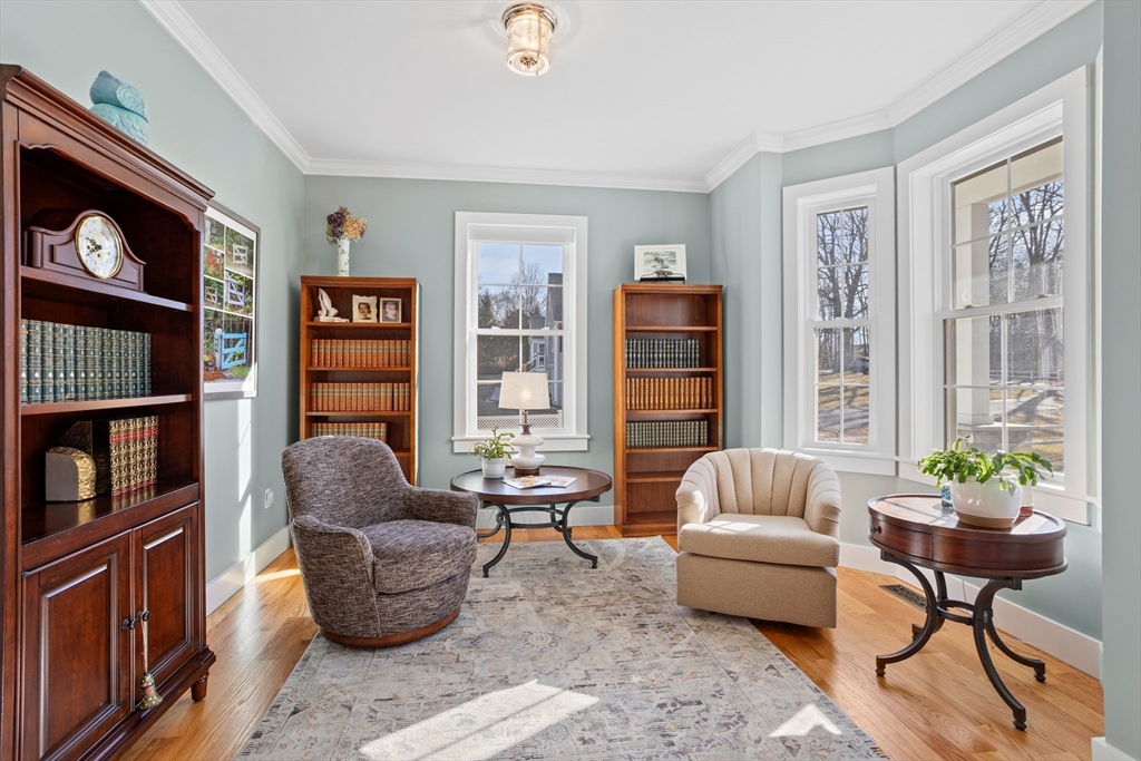 135 South Road Holden, MA 01520 - Photo 3 of 42 a living room with furniture a rug and a window