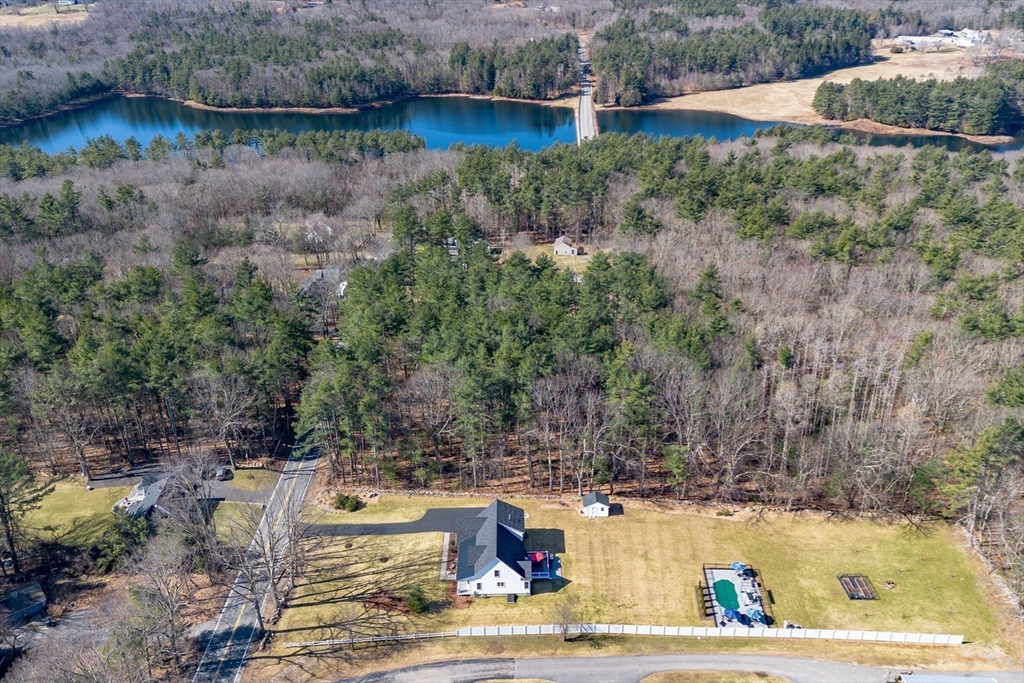 135 South Road Holden, MA 01520 - Photo 36 of 42 a view of a lake with large trees