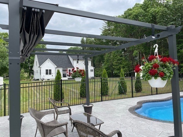 135 South Road Holden, MA 01520 - Photo 38 of 42 a view of a chair and tables in patio of the house