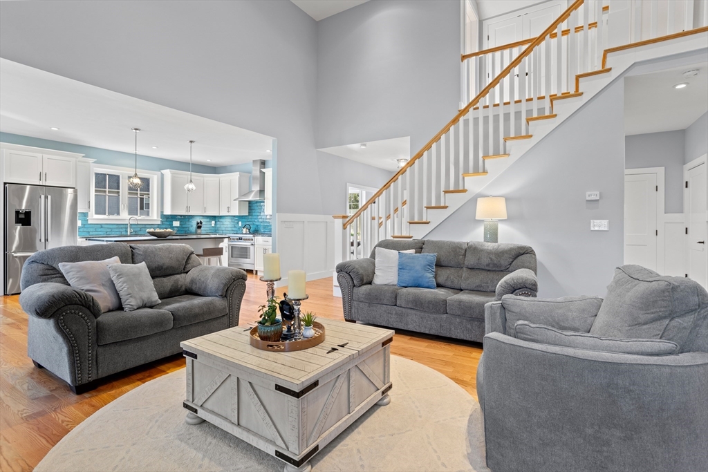 135 South Road Holden, MA 01520 - Photo 6 of 42 a living room with furniture and a dining table