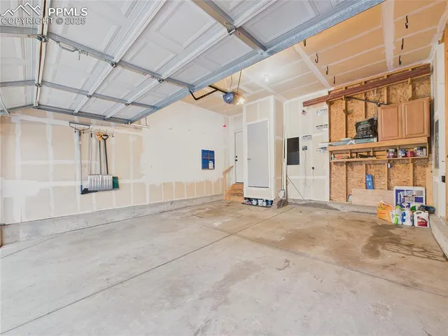 a view of a building with a garage