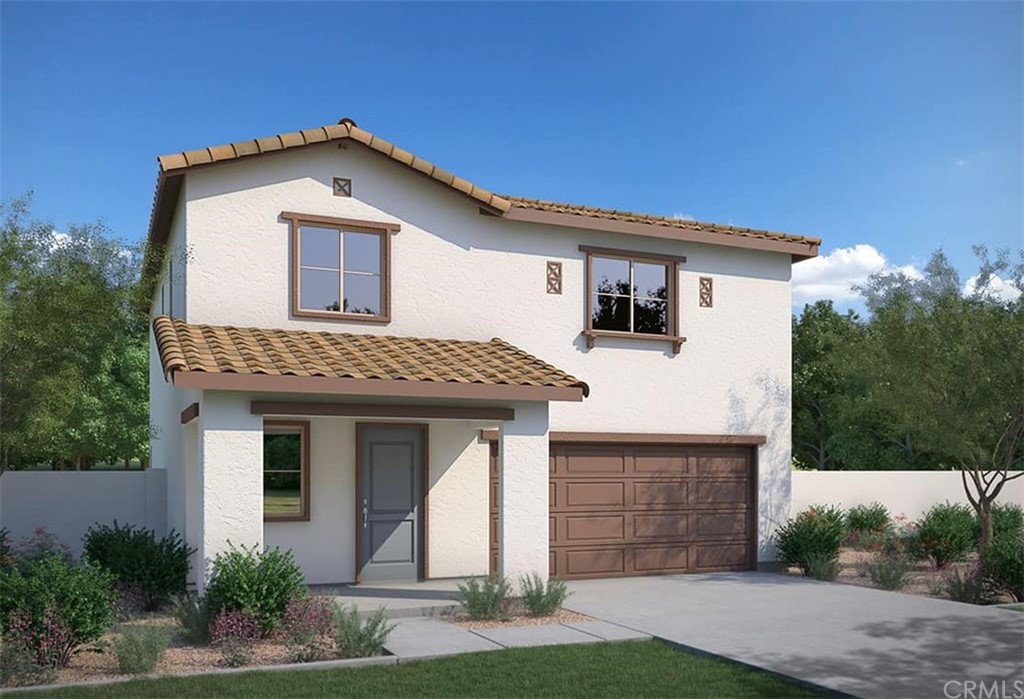 24025 Raptor Way Lake Lake Elsinore, CA 92532 - Photo 1 of 1 a front view of a house with a yard and garage