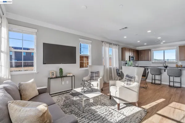 a kitchen with a dining table and chairs