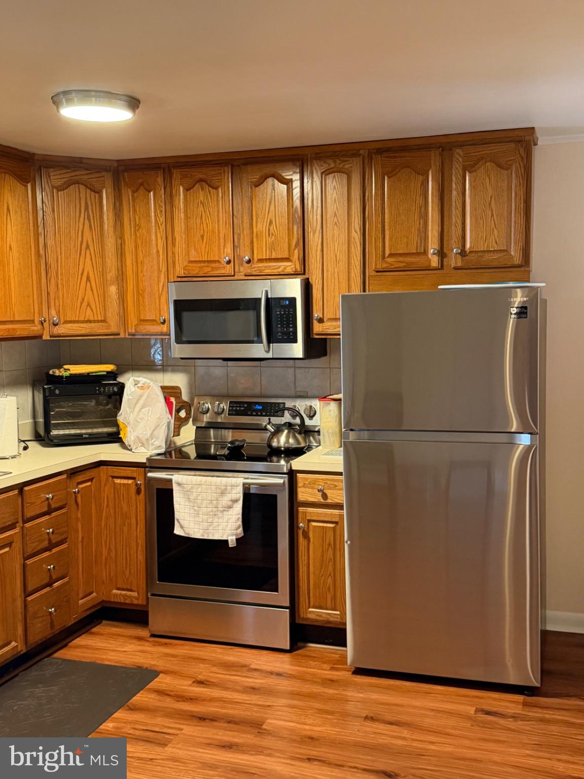 24357 Longview Road Chaptico, MD 20621 - Photo 4 of 22 Modern kitchen with warm wood tones.