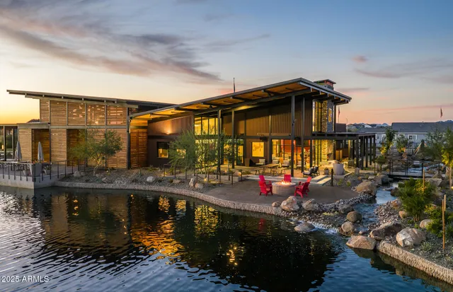 a view of a house with sitting area and furniture