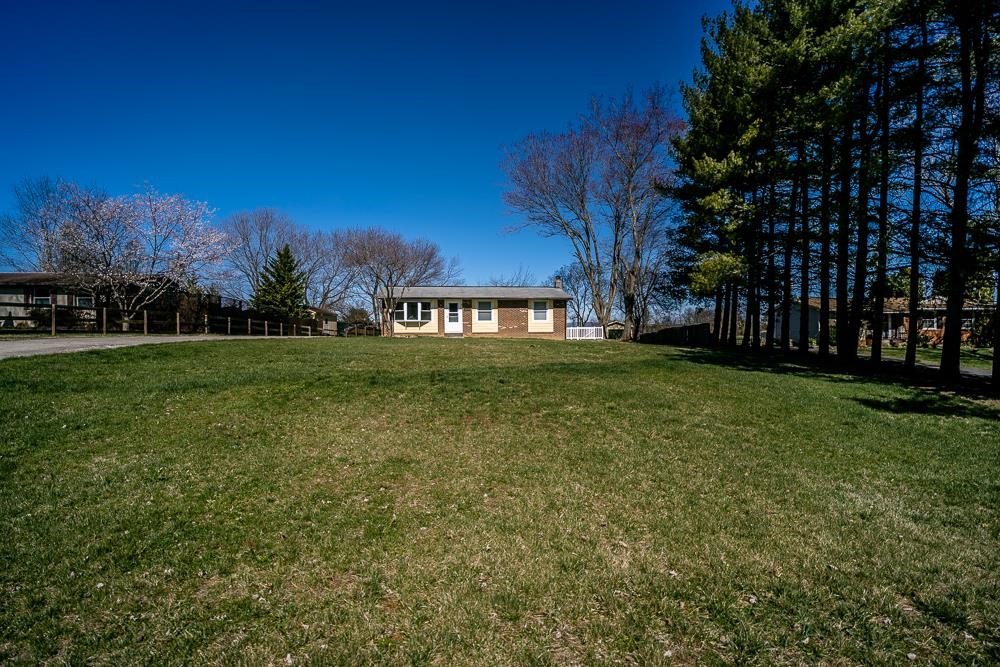 2574 Spaders Church Road Harrisonburg, VA 22801 - Photo 27 of 28 a view of a yard with a house in the background