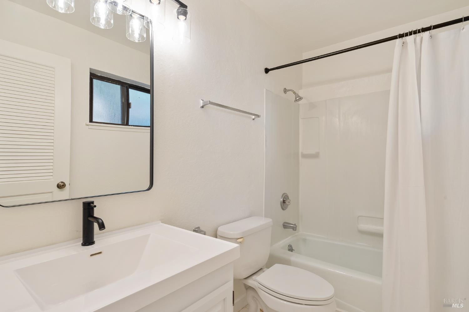 171 Glen Park Avenue San Rafael, CA 94901 - Photo 12 of 27 a bathroom with a sink toilet and shower