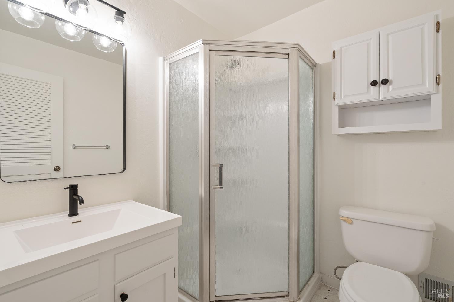 171 Glen Park Avenue San Rafael, CA 94901 - Photo 14 of 27 a bathroom with a sink a toilet and shower