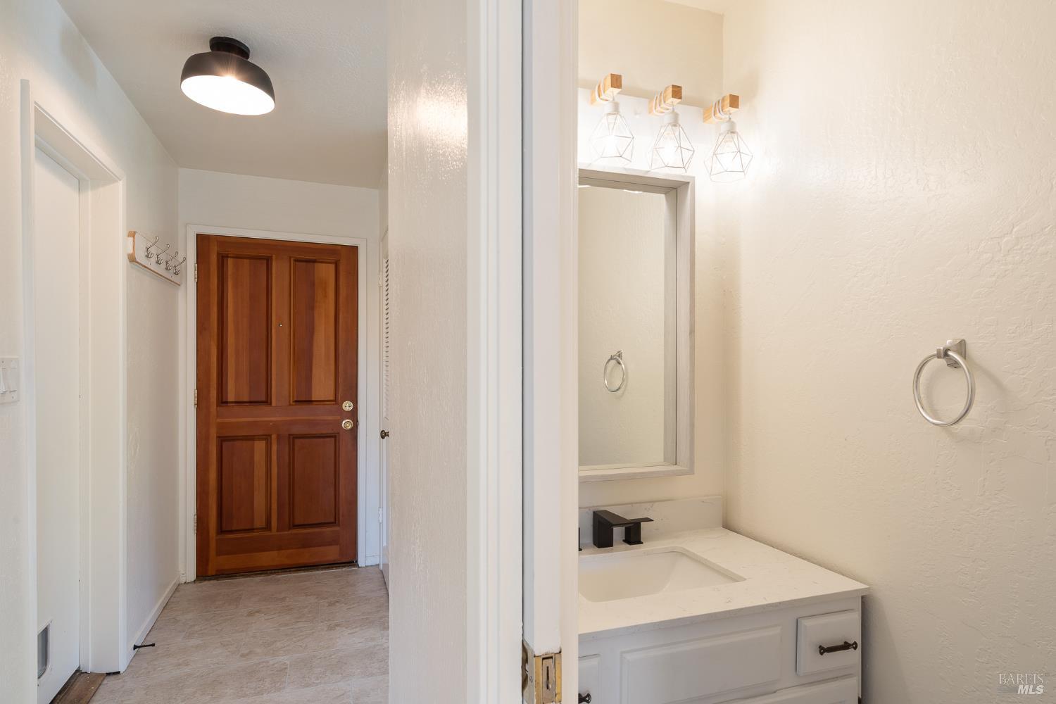 171 Glen Park Avenue San Rafael, CA 94901 - Photo 17 of 27 a bathroom with a sink and a mirror