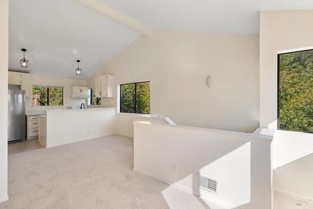 an empty room with windows