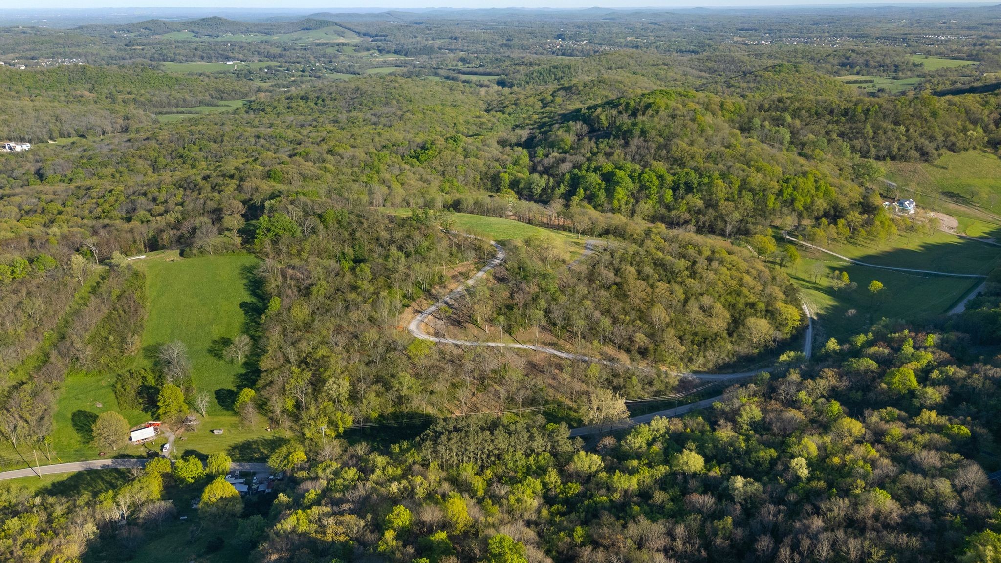 0 Burke Hollow Road Nolensville, TN 37135 - Photo 17 of 18 a view of a lake with a mountain
