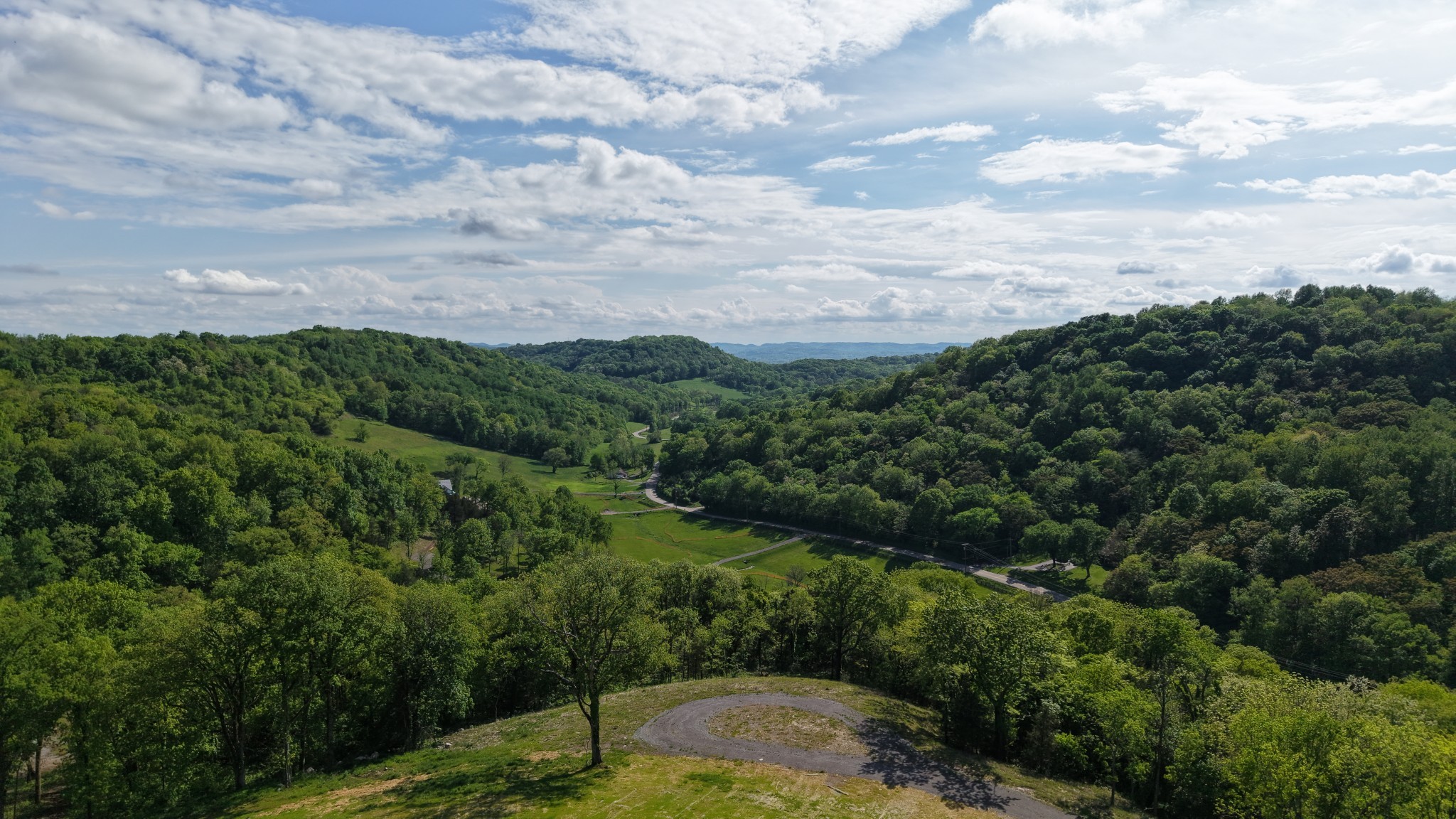 0 Burke Hollow Road Nolensville, TN 37135 - Photo 7 of 18 a view of a lake with houses in back