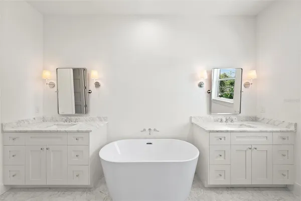 a bathroom with a sink toilet and vanity
