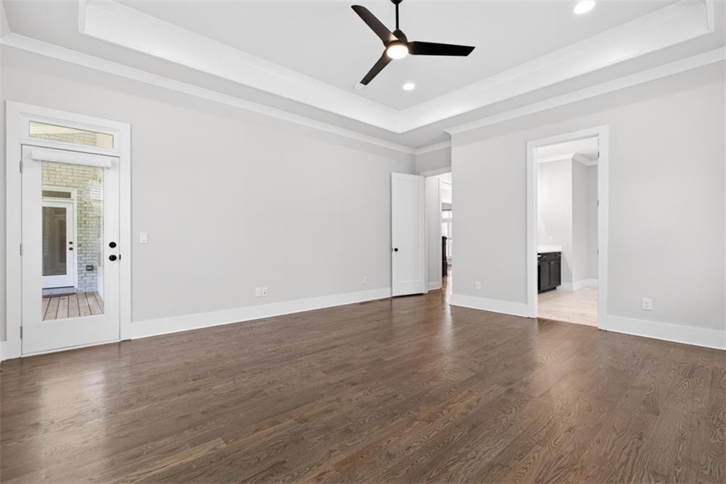 3528 North Bogan Road Buford, GA 30519 - Photo 24 of 79 a view of an empty room with wooden floor