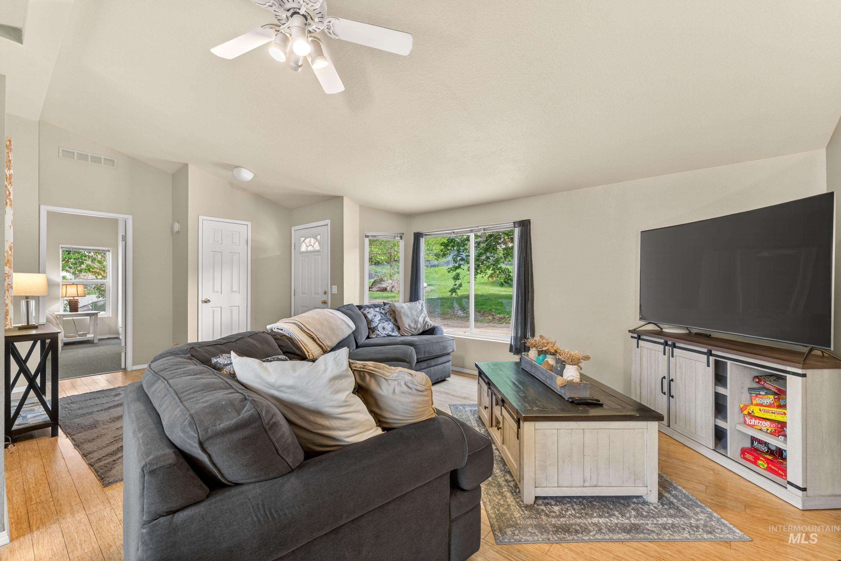 151 Cow Creek Road Lucile, ID 83542 - Photo 8 of 50 Living area featuring wood-finish flooring and neutral-toned walls