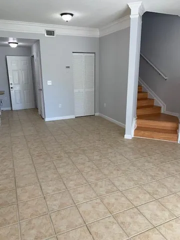 a view of entryway with stairs