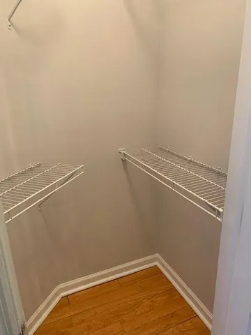 a view of a room with racks on the wall